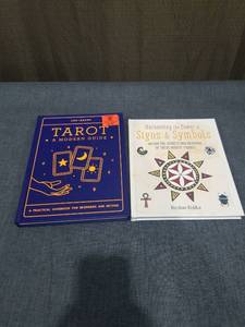 lot 2600 image: Tarot A Modern Guide by Jon Izzard and Harnessing Power of Signs & Symbols by Kirsten Riddle 2 Books