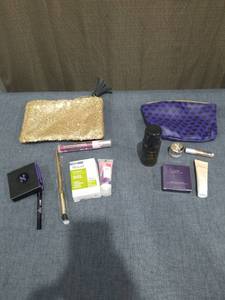 lot 2633 image: Beauty Cosmetics Lot with 2 Pouches, Brushes, and Skincare Products