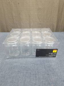 lot 2637 image: Glass Jars 12 Count 4 FL oz (118.29 mL) with Lids