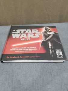 lot 2718 image: The Star Wars Vault by Stephen J. Sansweet Peter Vilmur Hardcover Book