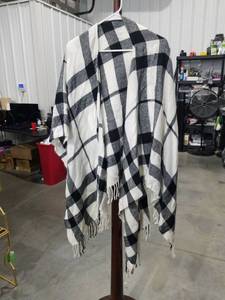 lot 2740 image: Black and White Plaid Poncho with Fringe Trim