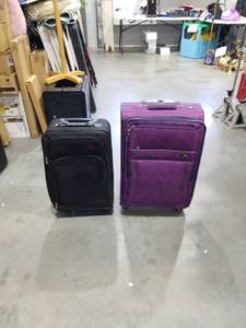 lot 2859 image: Soft-Side Upright Spinner Luggage Suitcases Lot of 2 Black and Purple