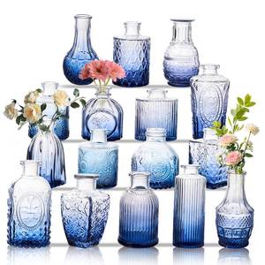 lot 5290 image: Glass Bud Vase Set of 16, Small Flower Vases, Glass Vases for Centerpieces, Vintage Home Table Decorations Bud Vases (16 Pcs, Blue) - Retail $31