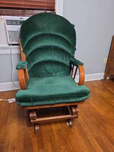 lot 103 image: Gliding Rocking Chair with Green Upholstery, Wood Frame