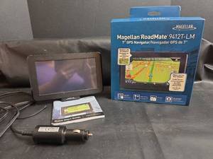 lot 141 image: Magellan RoadMate 9412T-LM 7 inch GPS Navigator
