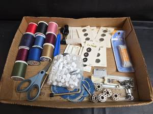 lot 217 image: Sewing & Craft Supplies- Thread, Bobbins, Buttons, Elastic, and Scissors