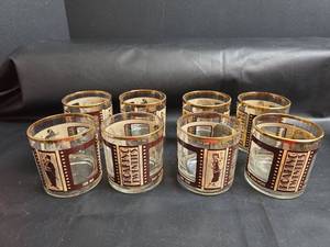 lot 225 image: MCM Roaring Twenties Movie Star Glasses Set of 8 with Gold Trim and Portraits
