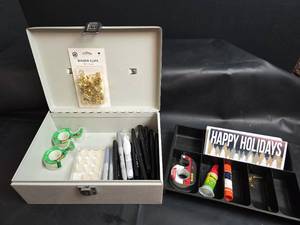 lot 229 image: Money Box with Binder Clips, Tape, Markers, and Adhesives