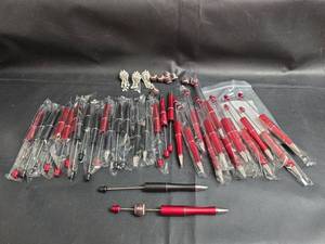 lot 236 image: Ballpoint DIY Beadable Pens - Red and Black with Beaded Chains and Footballs
