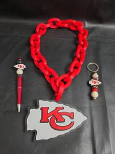 lot 274 image: Kansas City Chiefs Team Spirit Accessories Pen, Keychain, 3D Printed Necklace