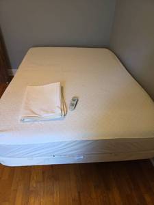 lot 301 image: Tempur-Pedic Adjustable Bed Base with Massage and Lift Control and Mattress Protector (Queen Size - Massage and Both Lift Controls Work)