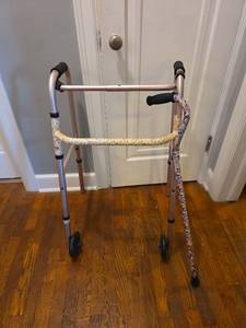lot 313 image: Rose Colored Two-Wheeled Walker with Floral Handle and Butterfly Pattern Walking Cane