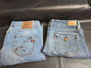lot 319 image: Womens Jeans Levis (size 11 medium) and Bootheel Trading Co. (size 3134)