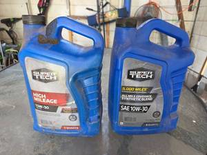 lot 523 image: Super Tech Motor Oil 5W-30 and 10W-30 5 Quart Bottles Lot of 2