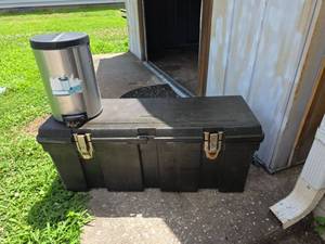 lot 526 image: Black Plastic Storage Trunk with Latches and Stainless-Steel Trash Can