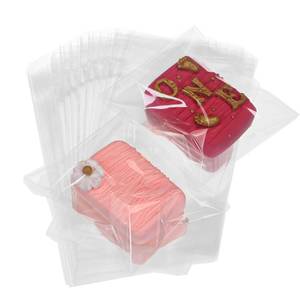 lot 72984 image: 100Pcs 4 x 6 Inch Clear Cellophane Bags for Cookies, Rice Krispie Treats, Macarons, Brownies, Soap, Chocolate Truffles, Candy - Ideal for Wedding & Birthday Party Favors - Retail $6