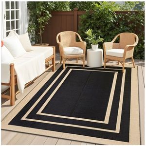 lot 63933 image: Outdoor Rug 5x8 ft Waterproof, Reversible Outdoor Plastic Straw Rug, RV Mat, Indoor Outdoor Carpet Clearance for Patio, Camping, Balcony, Deck, Backyard, Black & Beige - Retail $36