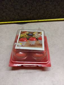 lot 2137 image: 4-Count Red Silicone Egglete set  with Carrier