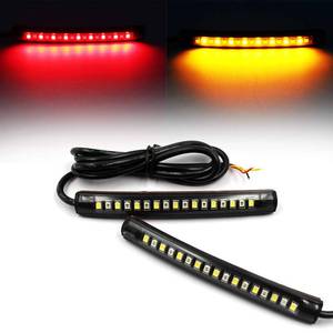 lot 17855 image: 2x Universal Flexible LED Turn Signal Tail Brake License Plate Light Integrated for Motorcycle Bike ATV Car RV SUV, BrakeRunning Tail Light(2Pack) (Amber Red) - Retail $10
