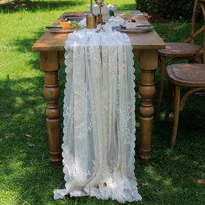 lot 17948 image: White Lace Table Runner 120 inch 10FT Floral Embroidered Boho Farmhouse Vintage Rustic Table Runners for Wedding Party Baby Shower Birthday Home Decor Holiday Decorations(White,27x120) - Retail $17