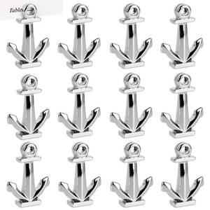 lot 38563 image: Nautical Anchor Place Card Holders, Set of 12, Metal Table Number Name Card Stands for Beach Wedding, Coastal Party, Reception, Dinner Table Decor, (Silver) - Retail $29