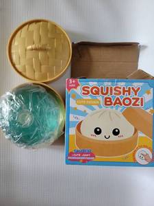 lot 38573 image: Glitter Dumpling Squishies, Colorful Dumplings Stress Balls, Sensory Fidget Slow Rising Squishy Stress Relief Toy, Squeeze Ball with Food Steamer Stretchy Desk, 2026 Upgrade (CrystalBlue) - Retail $10