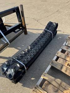 lot 66061 image: Mini Skid Steer Loader Rubber Track Approximately 8 Inch Width