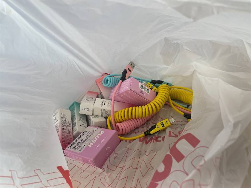 lot 311449 image: 15 Item Mystery Bag (misc. makeup, phone accessories, electronics, hug toys, stuffed animals, keychains, household items, etc.)