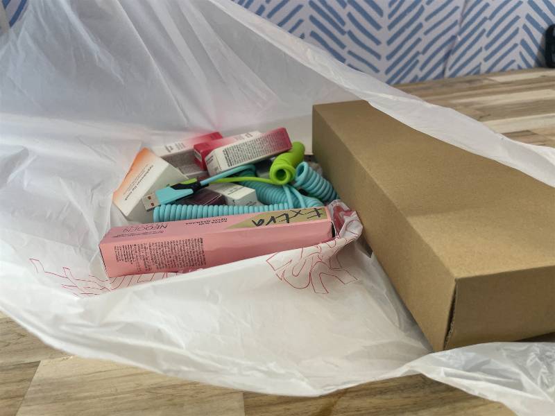 lot 311451 image: 15 Item Mystery Bag (misc. makeup, phone accessories, electronics, hug toys, stuffed animals, keychains, household items, etc.)