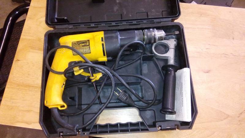 lot 3892 image: 7.8 Amp 12 in. Variable Speed Reversing Dual-Range Hammer Drill