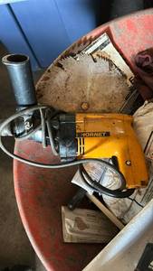 lot 7044 image: Hornet Corded Electric Drill with Circular Saw Blade