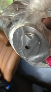 lot 7048 image: Engine Piston in Plastic Packaging