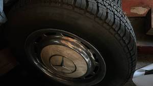 lot 7053 image: Mercedes-Benz Steel Wheel with Tire Set of 4 with Center Caps