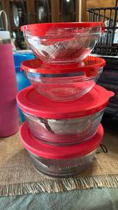 lot 7076 image: 4-Piece Glass Bowls with Red Lids