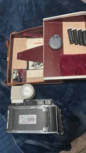 lot 60109 image: Polaroid 900 Electric Eye Land Camera with Accessories and Case