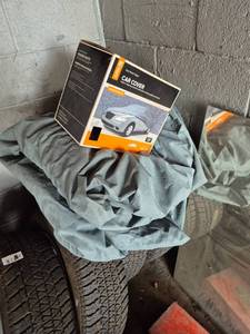 lot 25 image: Car Cover Gray Fabric Water Resistant Outdoor Protection