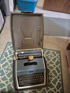 lot 29 image: Portable Manual Typewriter with Carry Case
