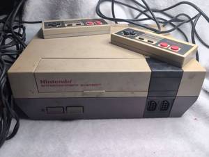 lot 2000 image: Nintendo Entertainment System Console with 2 Controllers and Super Mario Bros. 3 Game