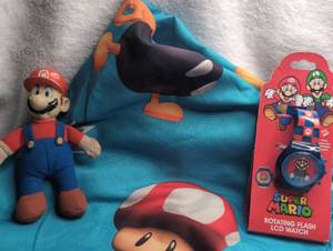 lot 2099 image: Super Mario Rotating Flash LCD Watch  Pillowcase  Plush Figure