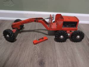 lot 2202 image: Metal Road Grader toy with articulated arm and detachable blade