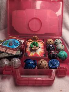 lot 2208 image: Bakugan Battle Brawlers Collectors Storage Case with Multiple Bakugan Figures and Cards
