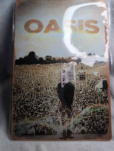 lot 3010 image: Oasis Self-Titled Album CD Cover Tin Sign
