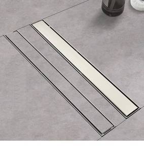 lot 7365 image: Linear Shower Drain 28 Inch Brushed 304 Stainless Steel Rectangle Shower Floor Drain with Reversable Tile-inPattern Drain Cover &amp Hair Catcher, Adjustable Feet