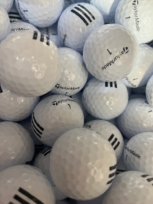 lot 2 image: Bundle of 24 new Taylormade Golf Balls 3 Stripe
