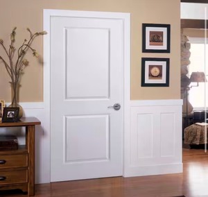 lot 54 image: BARNSMITH 30 in. x 80 in. Primed 2-Panel Square Hollow Core Composite Interior Door Slab Retails $200
