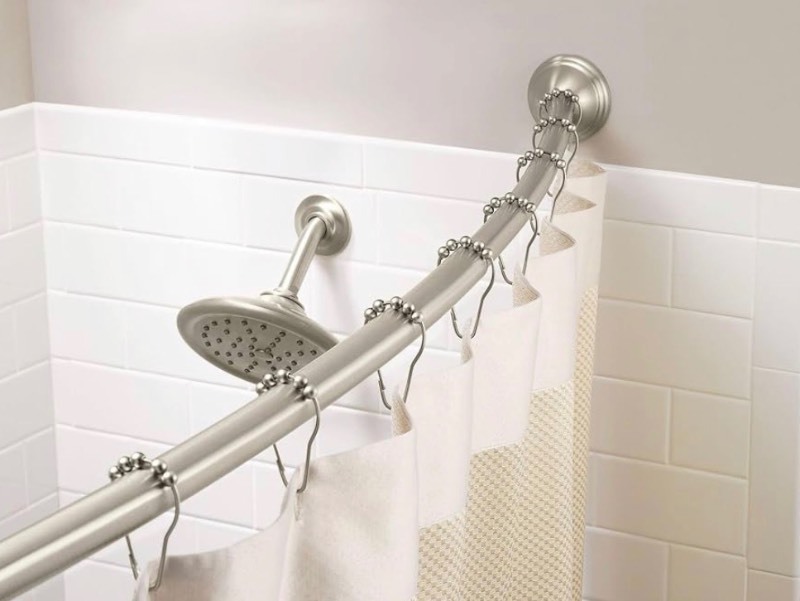 lot 52 image: Moen Curved Adjustable Length Fixed Mount Single Shower Curtain Rod for Bathroom, Brushed Nickel Finish, CSR2160BN