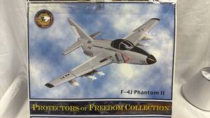 lot 49 image: Heritage Mint F-4J Phantom II Protectors of Freedom Collection Wooden Plane