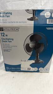 lot 68 image: Utilitech 12 IN Oscillating Desk Fan Model 48916882