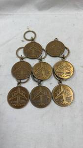lot 126 image: Boeing KC-135 Wing Reskin Program Commemorative Keychains - 8-Piece Lot