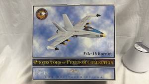 lot 132 image: Heritage Mint FA-18 Hornet Protectors of Freedom Collection Wooden Plane Model